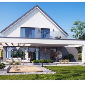 Rear view of a modern villa with a large glass balcony, patio seating area, and green landscaping. The open-concept design and floor plans highlight seamless indoor-outdoor living.
