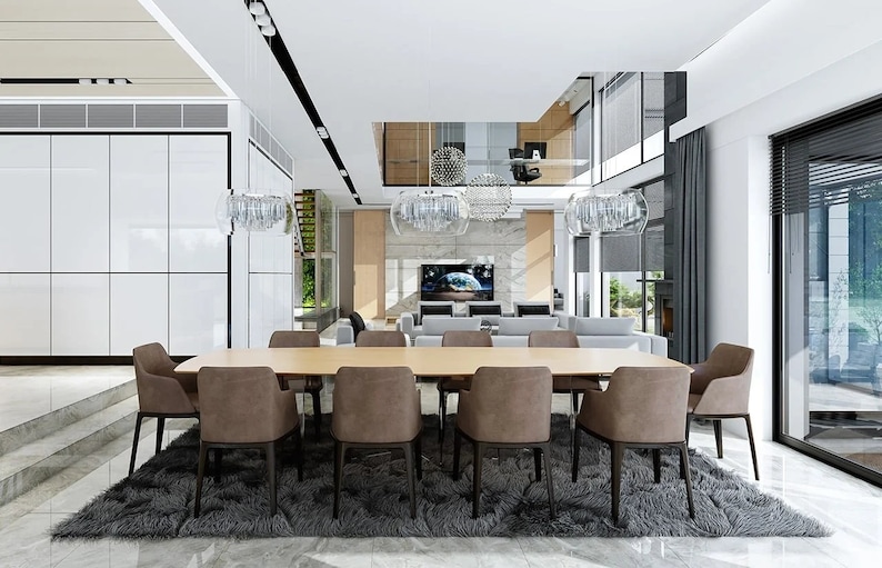 Sophisticated dining area with minimalist decor, glass chandeliers, and an open living room view. A beautiful element in modern house blueprints.