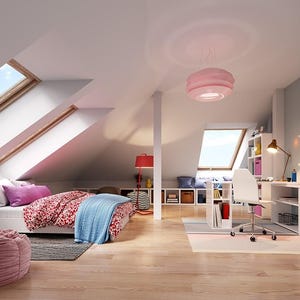 May include: An attic bedroom featuring a bed with a red patterned duvet and blue throw, a pink beanbag chair, a white desk with a rolling chair, a pink pendant light, and skylights. The room includes white furniture, wooden flooring, and wall shelving.