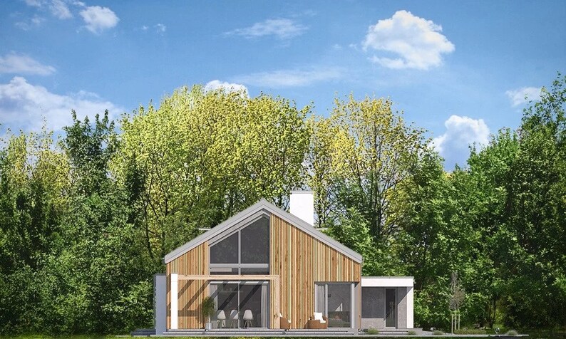 Rear view of a stylish Scandinavian house: The rear view of a Scandinavian house featuring large glass doors opening to a serene outdoor space. Perfect for tiny home plans or modern cottage house plans.