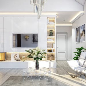 May include: A living room featuring a white wall unit with a built-in fireplace, a television, and open shelving. A glass coffee table with a white metal base sits in the center, holding a vase of white flowers near a white armchair.