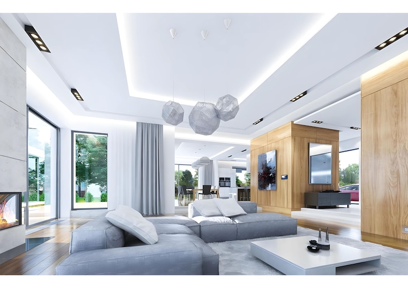 Spacious modern living area featuring an open floor plan, large windows, and elegant lighting fixtures. Includes cozy seating, a fireplace, and wood panel accents. Ideal for contemporary house plans and luxurious interiors.