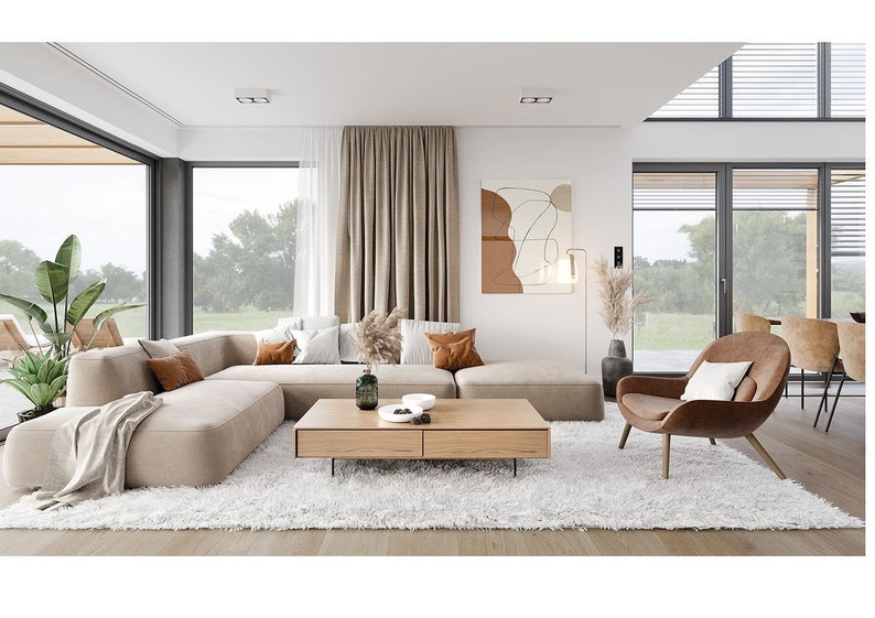 Scandinavian-inspired living room featuring a sectional sofa, textured rug, and natural light pouring in from large windows. Perfect for modern house plans with open-concept interiors.