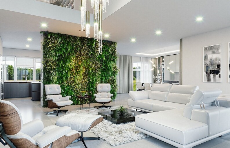 Spacious modern living room with vertical garden decor, white furniture, and an open layout. Suitable for Scandinavian house plans and cottage house plans.