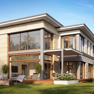 Rear view of a sleek two-story modern home featuring a wooden deck and minimalist landscaping. Perfect for modern house plans and townhouse enthusiasts.