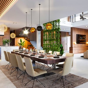 A beautifully designed kitchen with modern appliances, a large island, and minimalist decor. A great addition to open-concept house plans or townhouse plan designs.