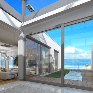 Indoor-outdoor living with glass walls and scenic views. A Scandinavian-inspired house plan with a minimalist touch, perfect for cozy homes.