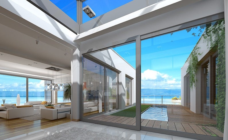 Indoor-outdoor living with glass walls and scenic views. A Scandinavian-inspired house plan with a minimalist touch, perfect for cozy homes.