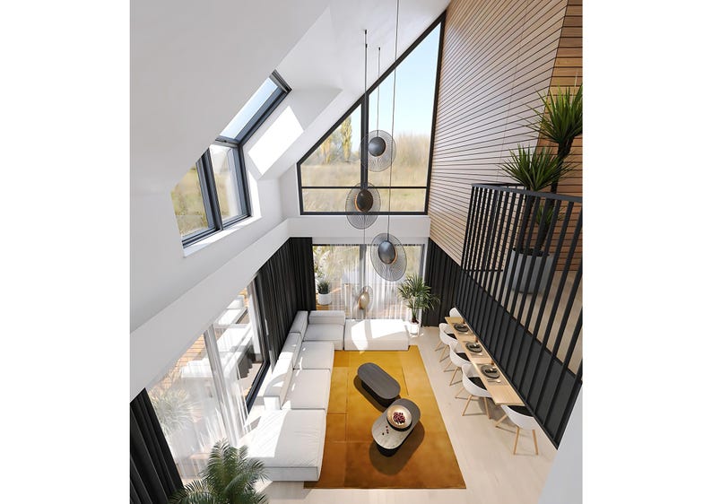 Bright and airy living space with floor-to-ceiling windows, a loft-style design, and modern decor. Perfect for contemporary house plans and innovative interior layouts.