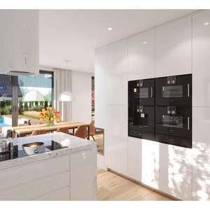 Sleek kitchen with built-in appliances, white cabinets, and a marble countertop overlooking the pool area, great for open-concept floor plans in modern homes