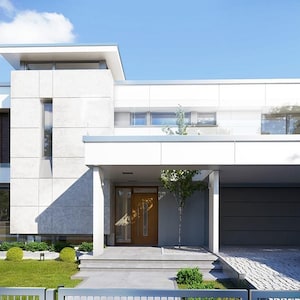 May include: Modern two-story house with a white exterior, featuring large windows, a garage, and a small tree in front. A gray car is parked in the driveway. The house has a minimalist design with a flat roof and a green lawn.
