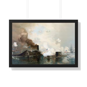May include: Framed print of a historical naval battle scene. Two ironclad warships are engaged in combat, with smoke billowing from their structures. The painting features a cloudy sky and a body of water.
