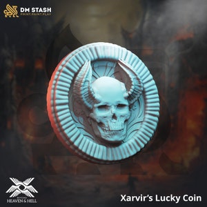 May include: A blue and white coin with a skull with horns and wings in the center. The coin has the text "Xarvir's Lucky Coin" on the bottom.