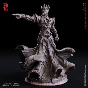 May include: A detailed miniature figurine of a dark-skinned, horned figure wearing a crown and a flowing robe. The figure is pointing with its right hand and has a menacing expression. The miniature is painted in shades of brown and black and is set on a circular base.