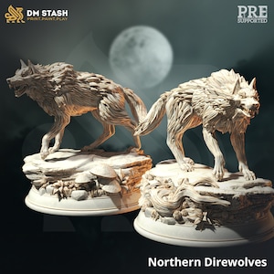 May include: Two detailed, white, 3D printed miniature direwolf figures with a snarling expression. The figures are posed in a running stance and are set on a base with a rocky and mossy texture. The text "Northern Direwolves" is printed below the figures.