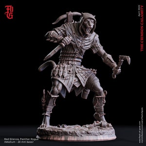 May include: A detailed miniature figurine of a panther rogue, painted in a bronze color. The figure is wearing a hooded cloak, leather armor, and holding a dagger and a small axe. The figure is standing on a rocky base.