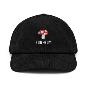 May include: Black corduroy baseball cap with a red and white mushroom graphic and the text "FUN-GUY" embroidered in white.