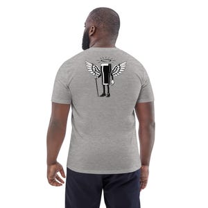 May include: A light gray t-shirt featuring a cartoon image of a pint of beer with angel wings, a halo, and a cane. The graphic is in black and white. The shirt is made of a soft material.