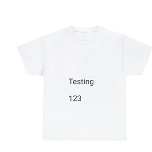 May include: White t-shirt with the text "Testing" and "123" printed on the front.