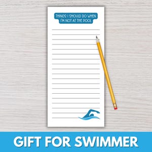 May include: White notepad with horizontal lines, a blue swimmer graphic, and the text "THINGS I SHOULD DO WHEN I'M NOT AT THE POOL." A yellow pencil rests on the notepad. The bottom of the notepad reads "GIFT FOR SWIMMER."