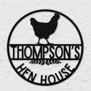 May include: Black metal sign with a silhouette of a chicken and the text "Thompson's Hen House".