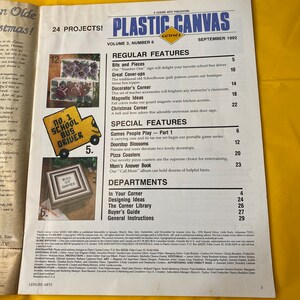 May include: A magazine cover for Plastic Canvas Corner, Volume 3, Number 6, September 1992. The cover features a colorful illustration of a school bus driver with the text "No. 1 School Bus Driver". The magazine features 24 projects and includes regular features such as "Bits and Pieces", "Great Cover-ups", "Decorator's Corner", "Magnetic Ideas", and "Christmas Corner".