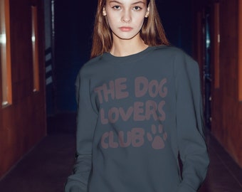 May include: A dark blue sweatshirt with the text "THE DOG LOVERS CLUB" in a pink color with a paw print.