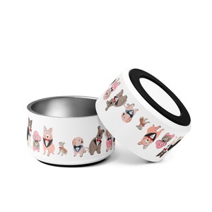 May include: Two white dog bowls with a black rim. The bowls are decorated with a pattern of dogs wearing bow ties and hats. The bowls are stacked on top of each other.