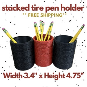 May include: Three pen holders made to look like stacked tires, one red and two black, each filled with yellow pencils. The text "stacked tire pen holder" is at the top. The dimensions are 3.4" wide and 4.75" high.