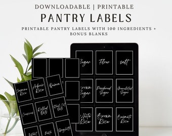 May include: Printable pantry labels with 100 ingredients and bonus blanks. The labels are black with white text and are displayed on a tablet screen. The text on the labels includes "Sugar", "Flour", "Salt", "Brown Sugar", "Powdered Sugar", "Granulated Sugar", "White Rice", "Brown Rice", "Basmati Rice", "Jasmine Rice", "Arborio Rice", "Quinoa", "Couscous", "Rolled Oats", "Steel Cut Oats", "Instant Oats", "Pasta", "Spaghetti".