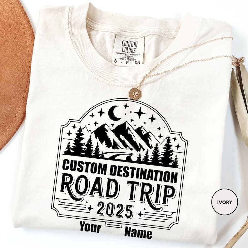 a white t - shirt with the words custom destination road trip on it