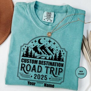 a t - shirt that says custom destination road trip on it