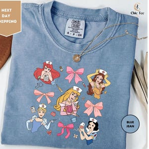 Comfort Colors Coquette Bows Disney Princesses Nurse Shirt, Nursing School Shirt, Disney Nurse Shirts, Women Disney Trip Shirt, Disney Shirt