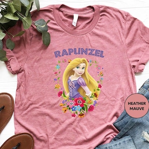 a pink shirt with a picture of rapunzel on it