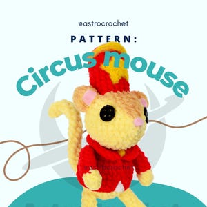 May include: A crocheted Circus Mouse toy in yellow, red, and tan. The mouse wears a red jacket and a circus hat. The image includes the text "Circus mouse" and "@astrocrochet".