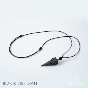 May include: Black obsidian pendant necklace with a pointed, geometric shape. The pendant is suspended from a black cord with adjustable knots. The text "BLACK OBSIDIAN" is at the bottom of the image.