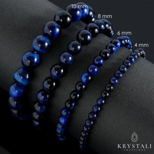 May include: Four blue tiger's eye gemstone bracelets with different bead sizes: 4 mm, 6 mm, 8 mm, and 10 mm. The bracelets are arranged in order of size, with the smallest bracelet at the bottom and the largest bracelet at the top.
