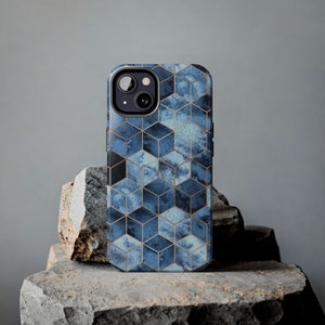 May include: A blue and gold geometric phone case with a camera lens cutout.