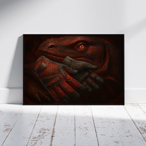 May include: A framed artwork featuring a detailed illustration of a reptilian creature with an intense orange eye. The creature's head is intertwined with a pair of red and black gloves, creating a striking contrast against the dark background.
