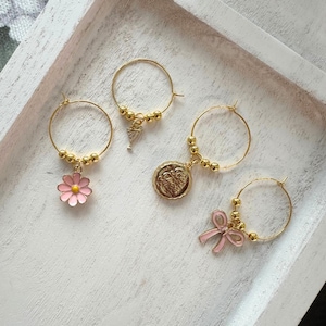 Girly Wine Glass Charms: Pink Flower, Bedazzled Cocktail, 'Be Free' Bottle Cap, Bow