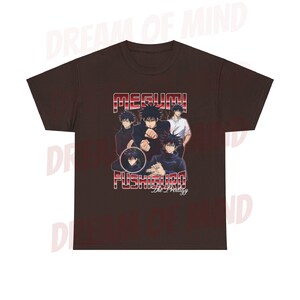 May include: A brown t-shirt with a retro-style graphic of anime characters. The graphic features the text "Megumi Fushiguro The Prodigy" in red and white.