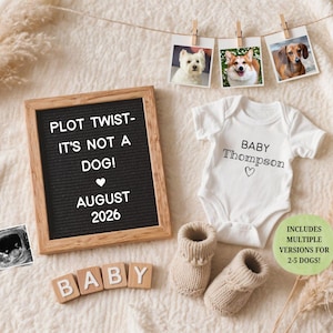 May include: A baby announcement featuring a letter board saying "PLOT TWIST - IT'S NOT A DOG! AUGUST 2026." A white baby bodysuit with "BABY Thompson" printed on it, and three dog photos. Includes baby booties and the word "BABY" in wooden letters.