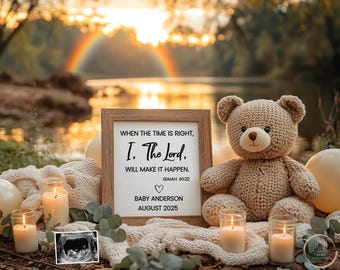 May include: A framed sign with a religious quote about the Lord making things happen. The sign is sitting on a white blanket with a teddy bear and candles. The quote is "When the time is right, I. The Lord. Will make it happen. Isaiah 60:22". The sign also says "Baby Anderson August 2025".