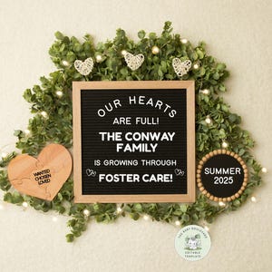 May include: A black letter board with the text "Our hearts are full! The Conway family is growing through foster care!" surrounded by greenery, a wooden heart with the text "Wanted Chosen Loved", and a round wooden sign with the text "Summer 2025".