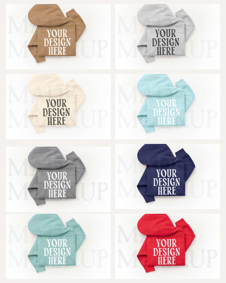 May include: Folded hoodies in a range of colours: tan, grey, cream, light blue, dark grey, navy, teal, and red. Each hoodie displays the text "YOUR DESIGN HERE" in white, bold font, centrally placed on the front.