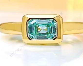 Octagon Swiss Blue Topaz Ring: Sterling Silver Bezel Solitaire