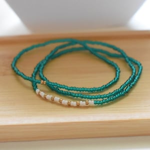 Tiny Teal beaded stretch bracelets-Transparent Teal w touches of white & gold-set of 3-Czech glass beads- kids-adults-mothers days- summer