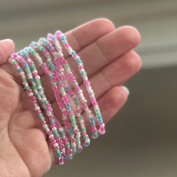 Set of EIGHT Stretch bead bracelets, Spring Bracelet, Valentines Day and Easter Bracelet, Seed Bead Bracelet. Stackable. Pastel beads