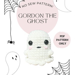 May include: A crochet pattern for a white ghost named Gordon. The pattern is a PDF download and is a no-sew project. The image shows a cute ghost with black eyes and a pink blush. The image also includes a spider web and a spider.