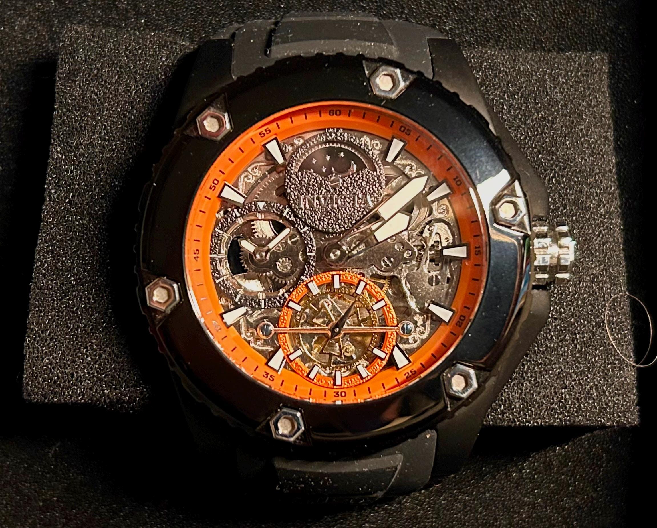NEW INVICTA AKULA Automatic Watch with Black Stainless Steel Casing Orange Rim and Clear Crystal Skeletal Works Display